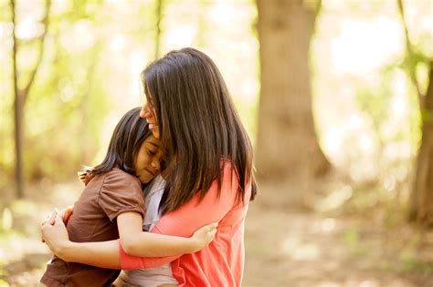 hugging mother and daughter